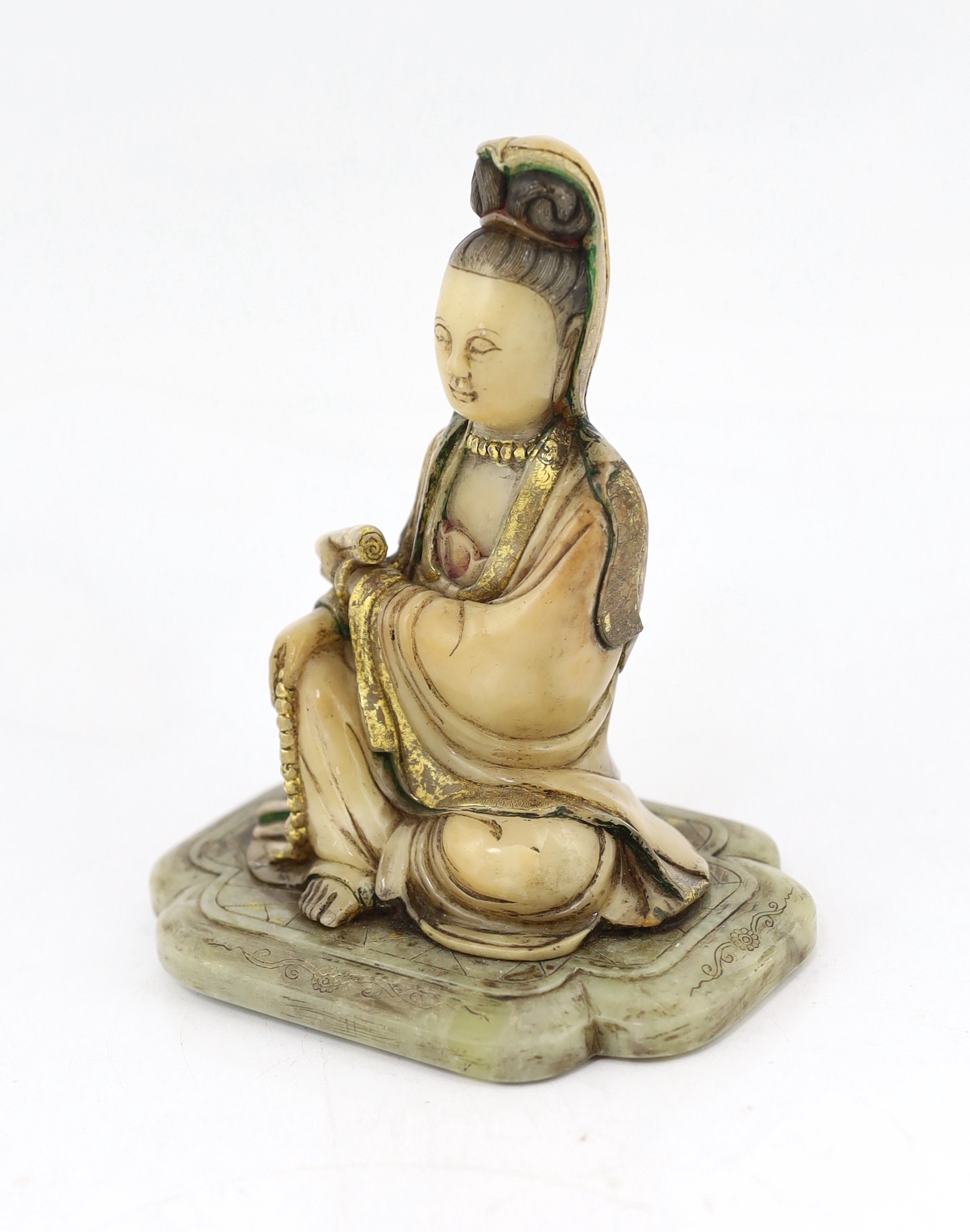 A Chinese soapstone seated figure of Guanyin, 17th/18th century